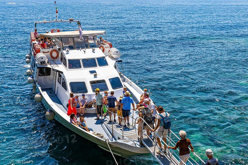 Tourists embark on the liner at Cinque Terre