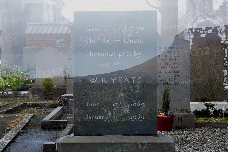 Double exposure of W. B. Yeats gravestone at Drumcliff graveyard underneath Ben Bulben mountain. Sligo