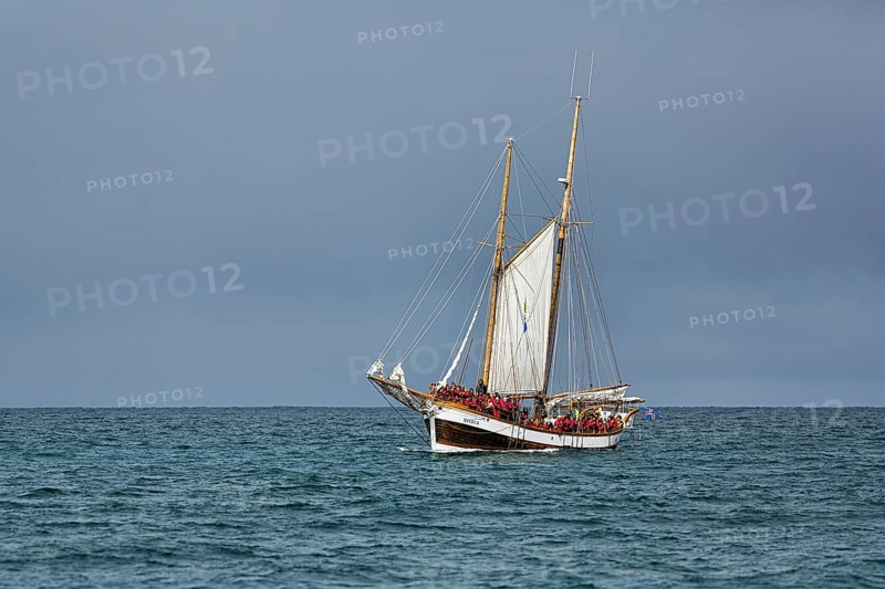 Sailing boat with tourists in summer