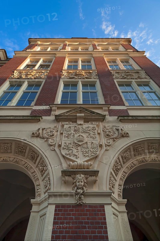 Main facade of the primary school with the old city coat of arms of Goerlitz