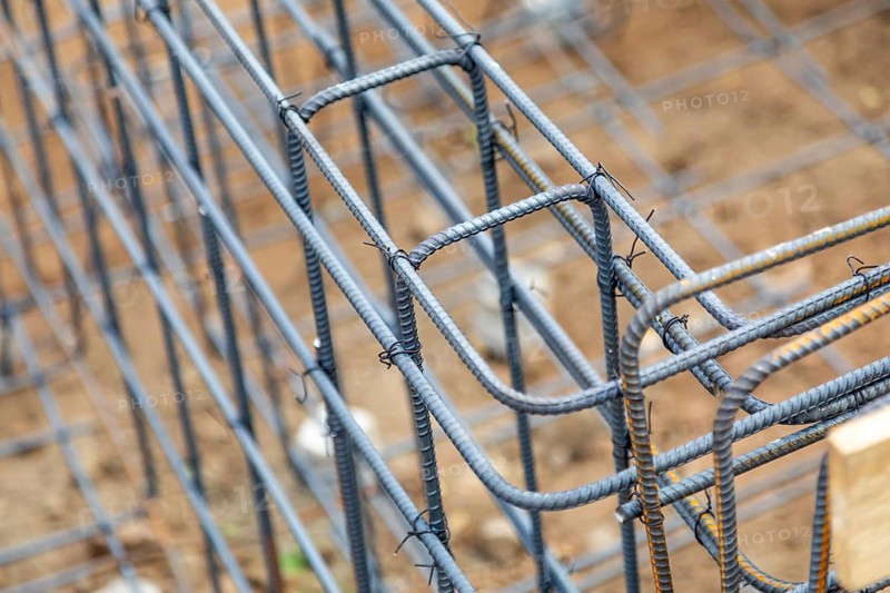 New steel rebar framing abstract at construction site