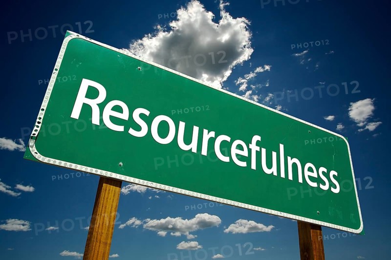 Resourcefulness road sign with dramatic clouds and sky