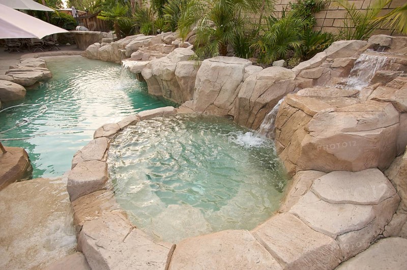 Tropical custom pool with waterfalls