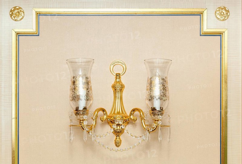Luxurious ornate gold wall chandelier abstract