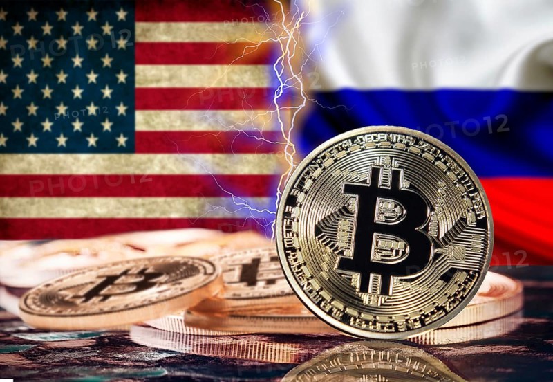 Bitcoin coin with russian flag and united states in the background