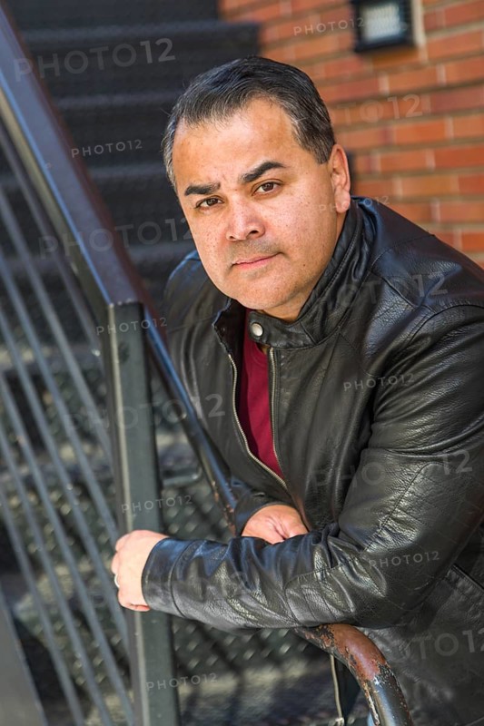 Headshot portrait of handsom hispanic man