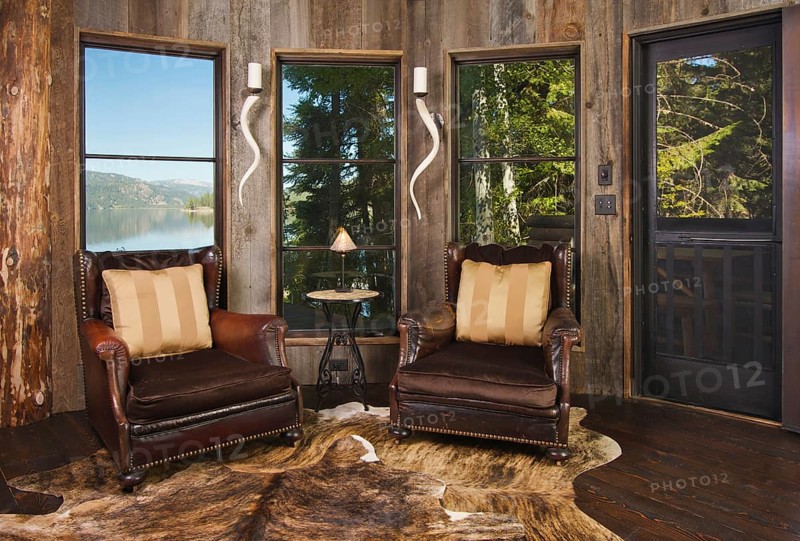 Luxurious rustic reading room in rural setting with lake view