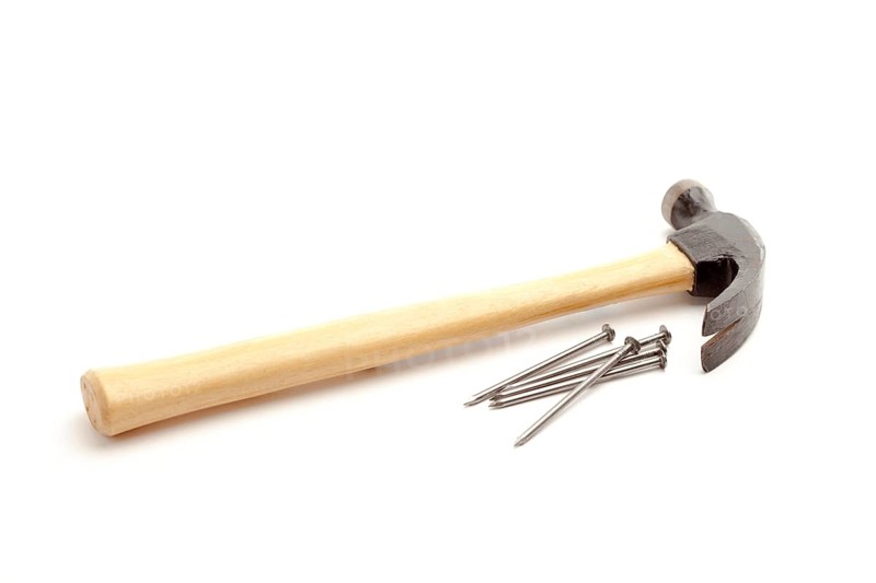 Hammer and nails isolated on a white background