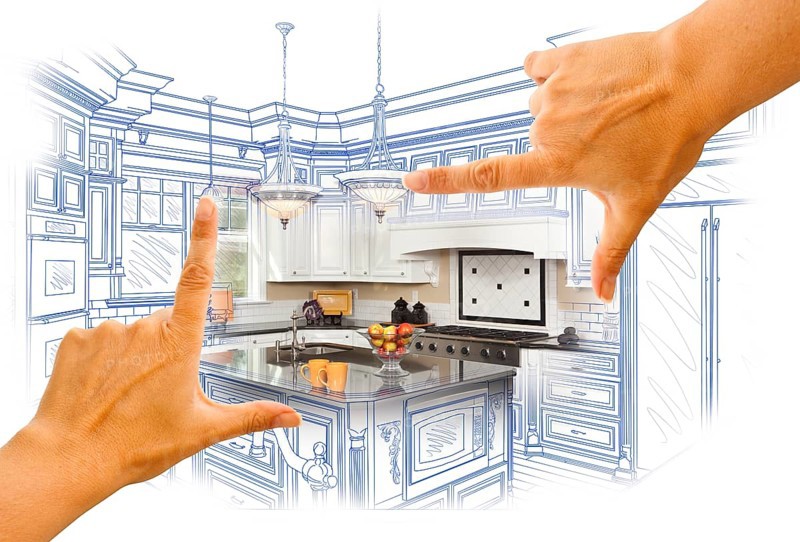 Female hands framing custom kitchen design drawing and photo combination