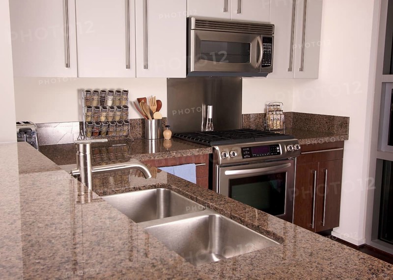 Modern kitchen with brushed aluminum appliances