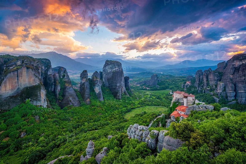 Monastery of Rousanou and Monastery of St. Nicholas Anapavsa in famous greek tourist destination Meteora in Greece on sunset
