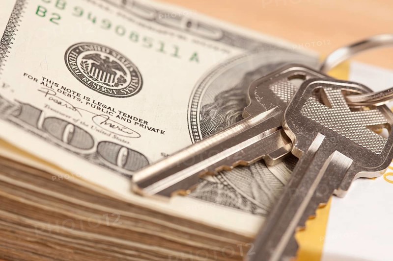 House keys on stack of money