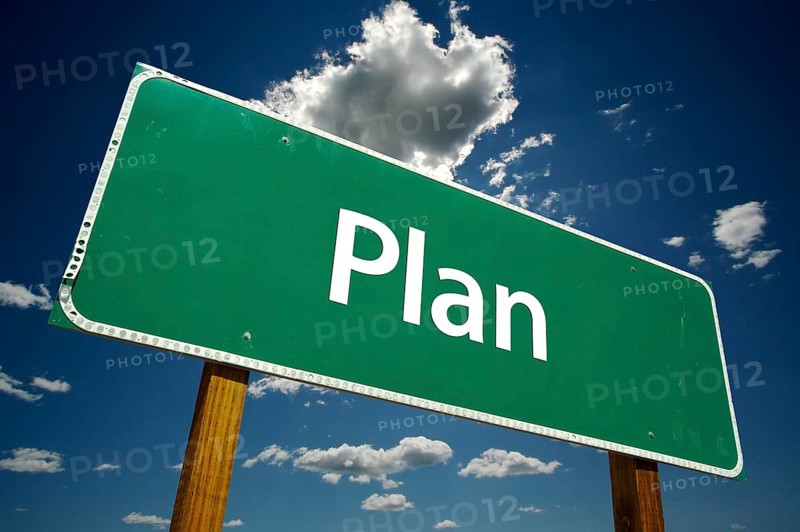 Plan road sign with dramatic clouds and sky
