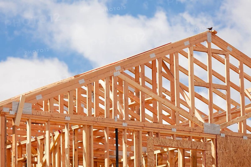 Abstract of wood home framing at construction site