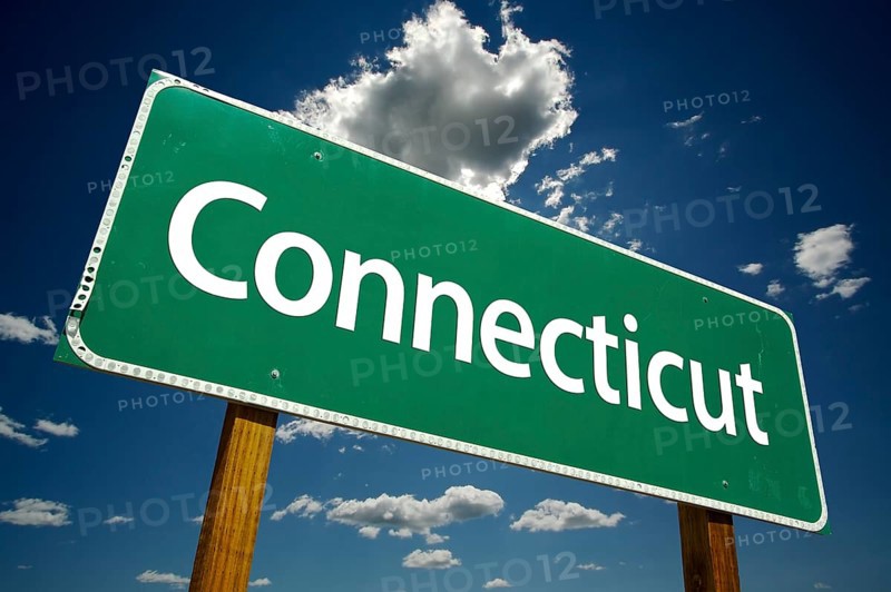 Connecticut road sign with dramatic clouds and sky