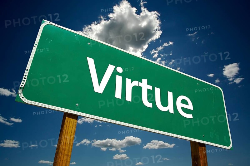 Virtue road sign with dramatic clouds and sky