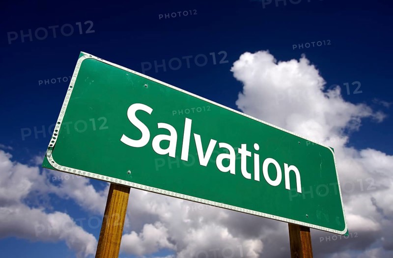 Salvation road sign with dramatic clouds and sky