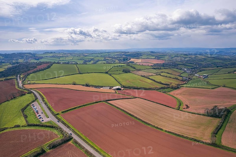 Devon Fields and Farmlands at sunset time from a drone over Shaldon and Teignmouth from Labrador Bay