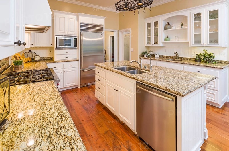 Beautiful custom kitchen interior with hard wood floors