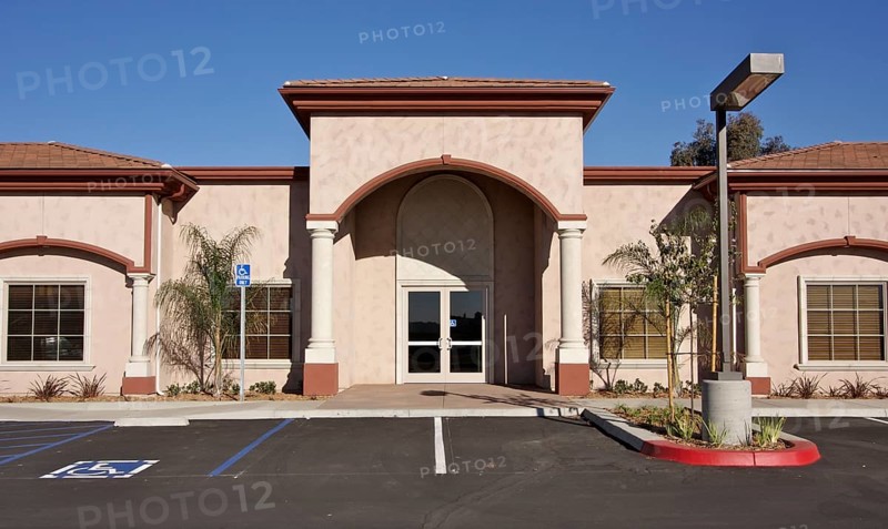 New vacant retail building and empty parking lot