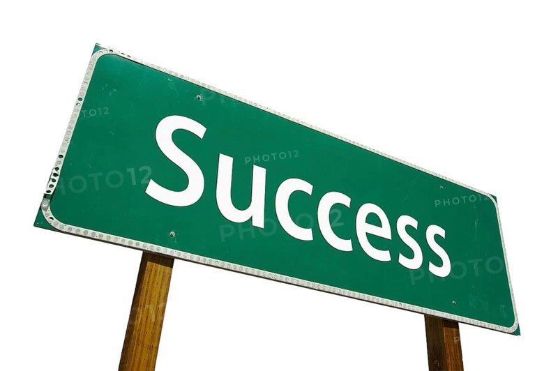Success road sign isolated on white with clipping path
