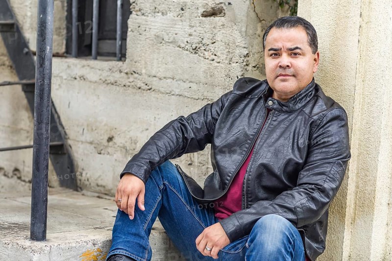 Headshot portrait of handsom hispanic man