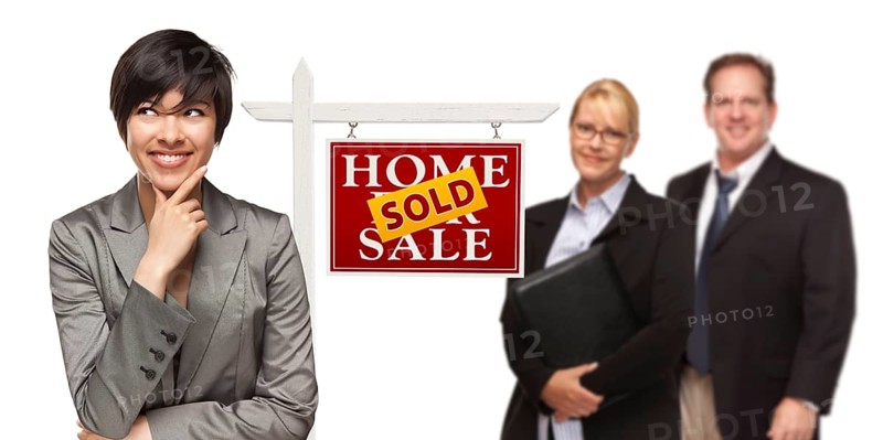 mixed-race people with sold home for sale real estate sign isolated on a white background