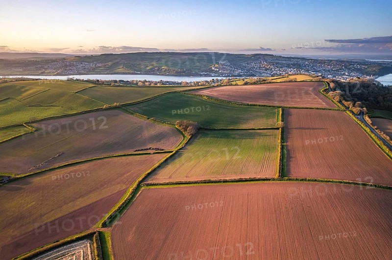 Devon Fields and Farmlands at sunset time from a drone over Shaldon and Teignmouth from Labrador Bay