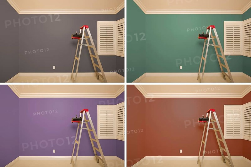 Set of empty rooms painted in variety of colors with ladder