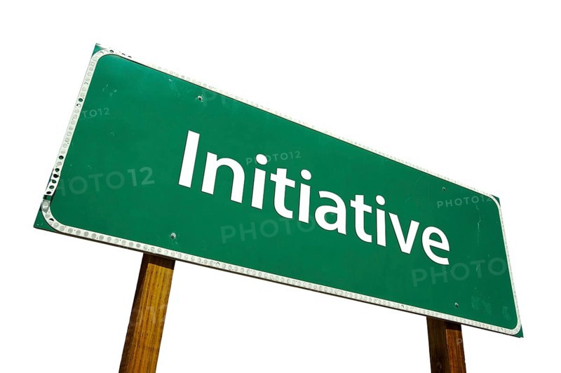 Initiative green road sign isolated on a white background with clipping path