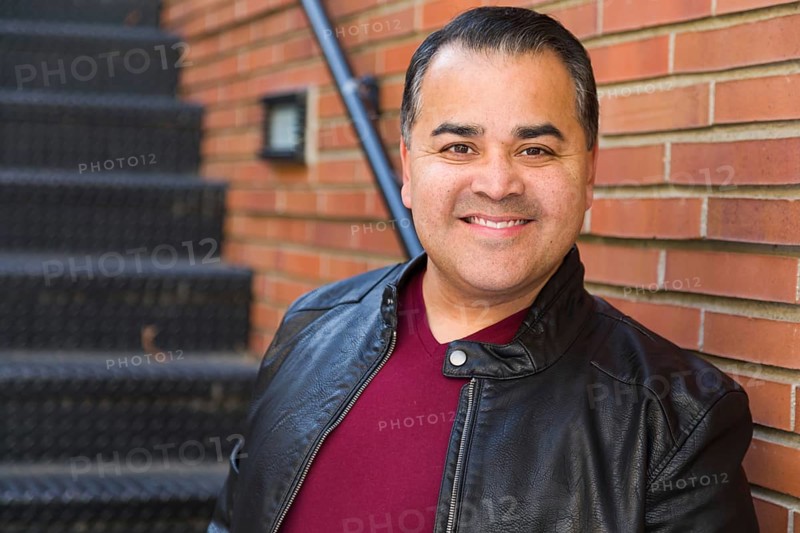 Headshot portrait of handsom hispanic man