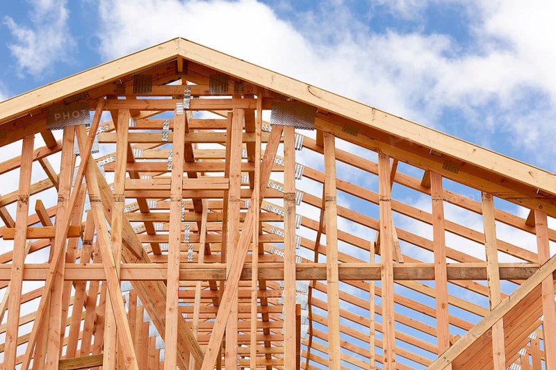 Abstract of wood home framing at construction site