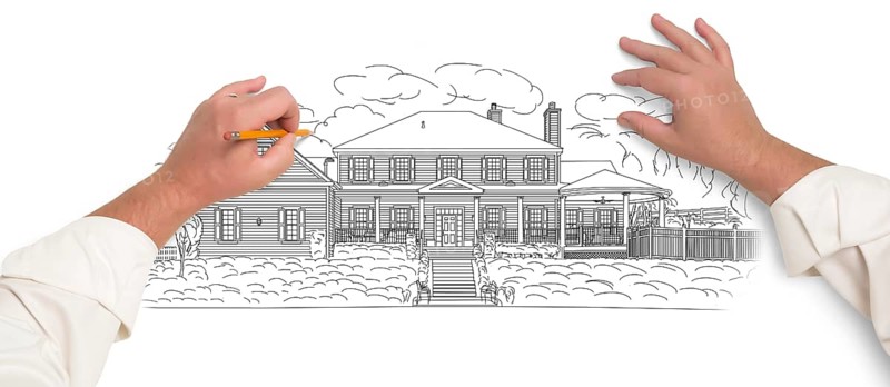 Male hands sketching with pencil the outline of a beautiful house on white
