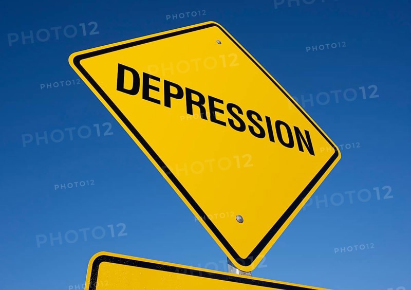 Depression yellow road sign against a deep blue sky with clipping path