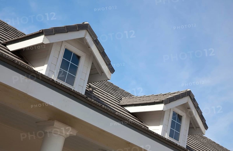 Abstract house facade against a blue sky