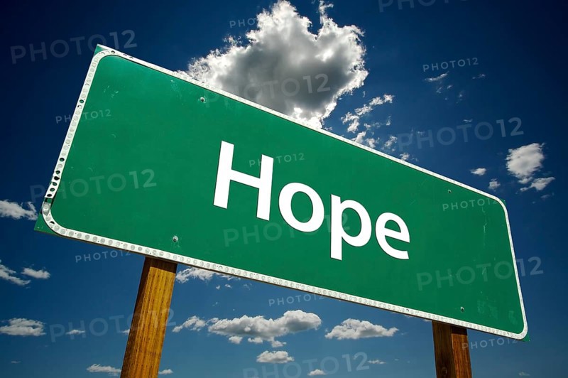 Hope road sign with dramatic clouds and sky