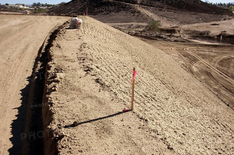 Sandbags & marker sticks at construction site
