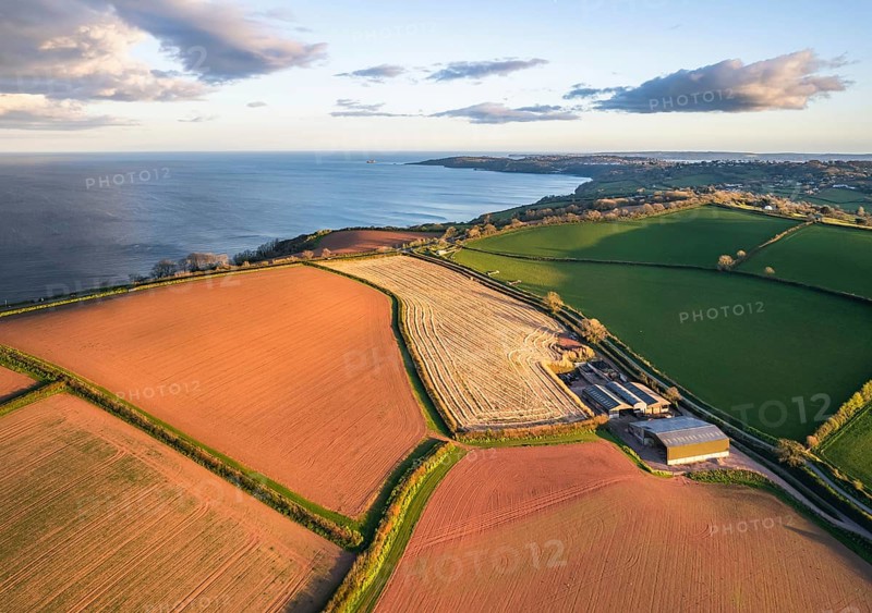 Devon Fields and Farmlands at sunset time from a drone over Labrador Bay