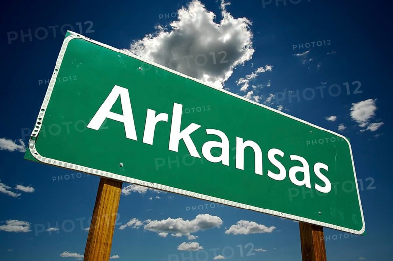 Arkansas road sign with dramatic clouds and sky