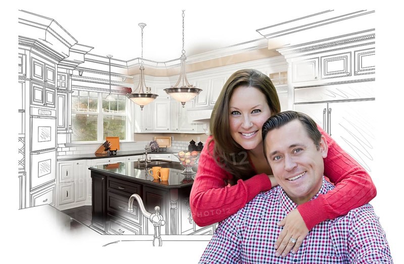 Happy couple with kitchen design drawing and photo behind