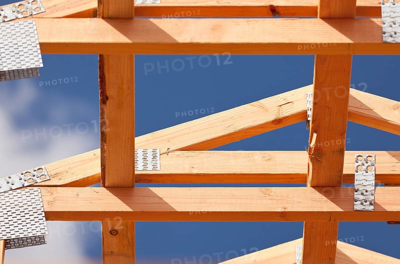 Abstract of wood home framing at construction site