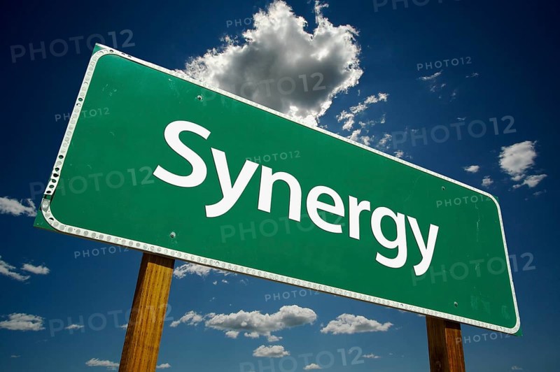 Synergy road sign with dramatic clouds and sky