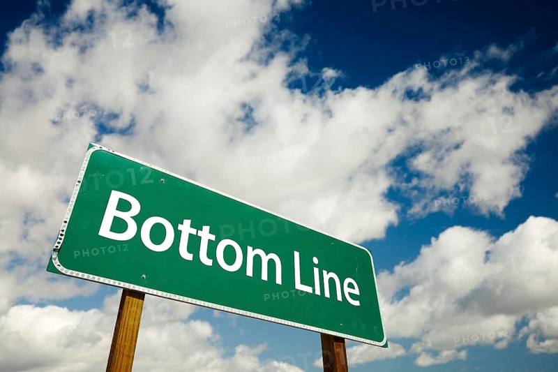 Bottom line road sign with dramatic clouds and sky