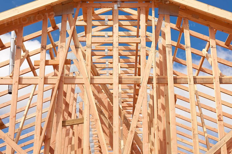 Abstract of wood home framing at construction site