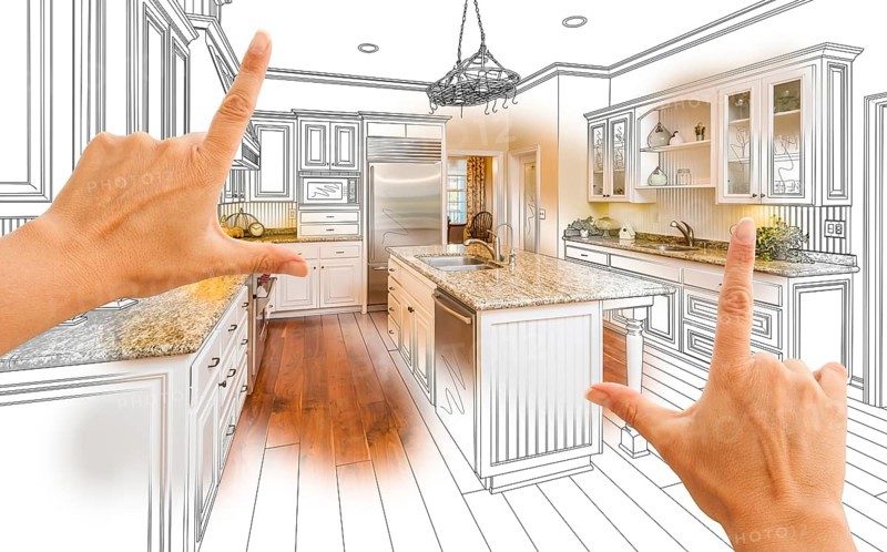 Female hands framing custom kitchen design drawing and photo combination