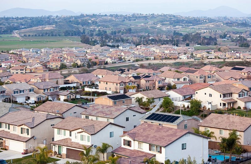 Contemporary neighborhood houses roof tops and horizon view
