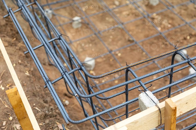 New steel rebar framing abstract at construction site