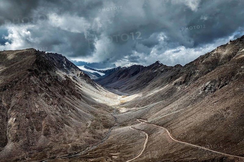 High altitude mountain road in Himalayas near Kardung La pass in Ladakh