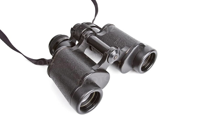 Black binoculars isolated on white background
