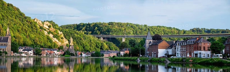 View of picturesque Dinant city over the Meuse river Dinant is a Walloon city and municipality located on the River Meuse